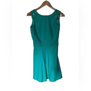 Woman’s emerald green dress silver studded shoulders and waist size S Easter